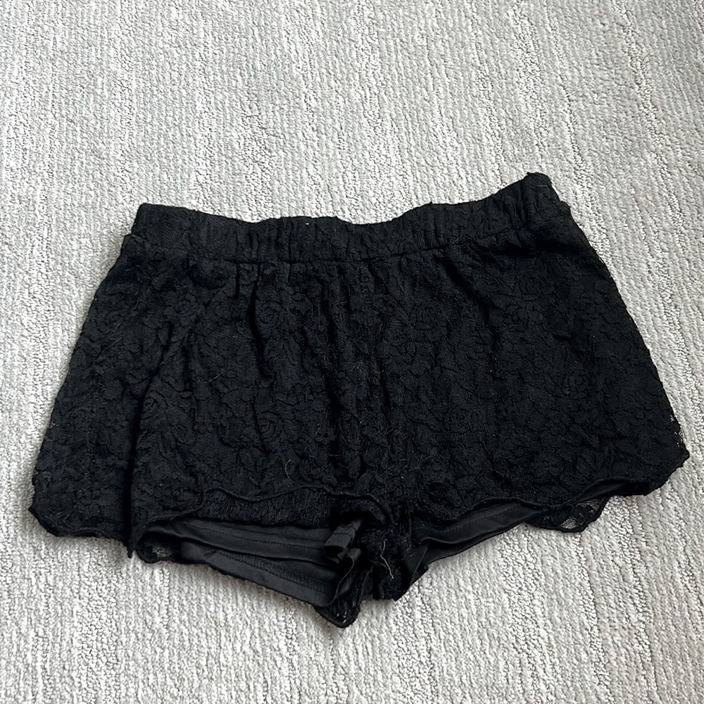 black shorts, angl